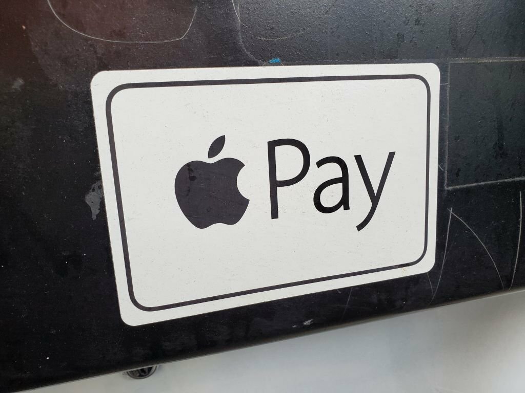 Sticker with logo for Apple Pay at a point of sale system in Lafayette, California, December 25, 2021. Photo courtesy Tech Trends.